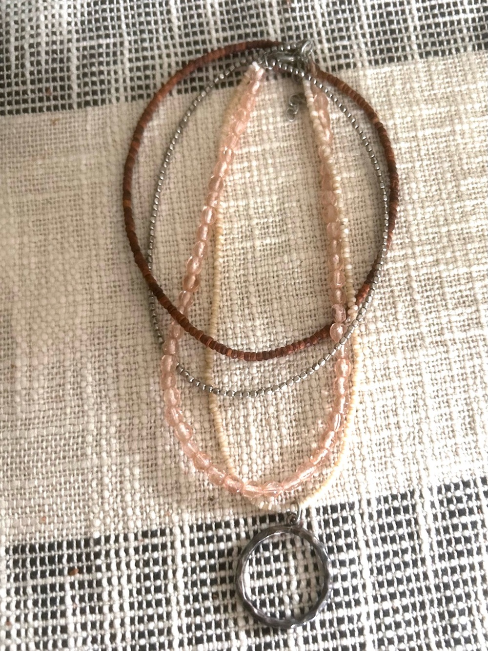 Multi-Strand Pink Beaded Necklace with Silver Pendant